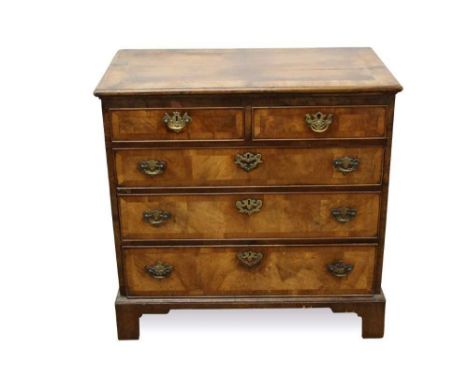 George I walnut veneered chest of two short and three long drawers with crossbanded decoration and brass handles on bracket f