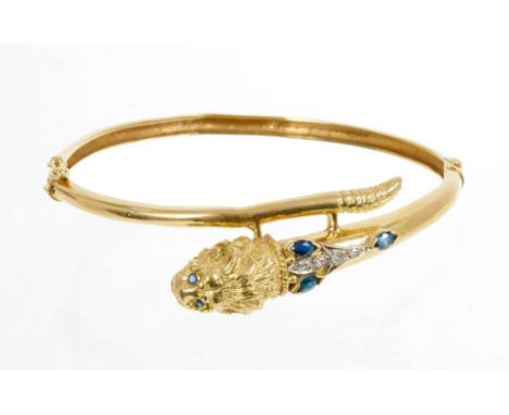 18ct gold bangle with lion's head terminal set with sapphires and diamondsCondition report: Not hallmarked but stamped 750. G
