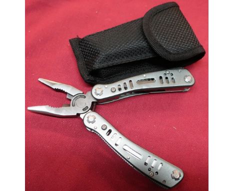 Boxed as new multi-tool with pouch 