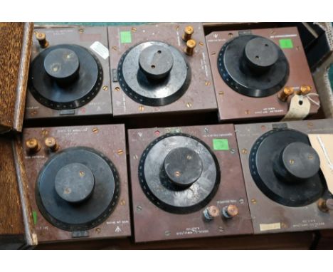 Eight various military condenser variable X6F units with broad arrow marks in wooden casings 
