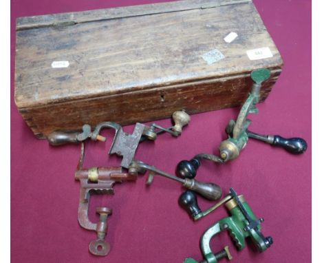 Vintage mahogany box containing four various vintage shotgun cartridge turnover tools 