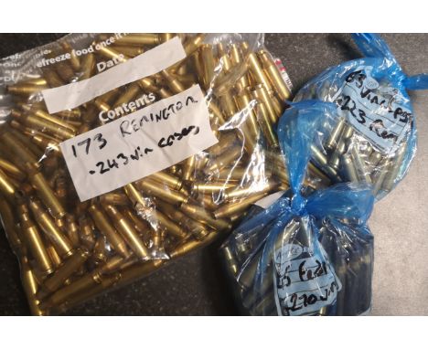 An extremely large collection of .243 ammunition casings including&nbsp; 80 Winchester, 107 federal and 173 Remington