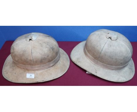 British military issue pith helmet complete with leather liner and chin strap, the liner stamped 6 7/8 Failsworth Hats Ltd 19