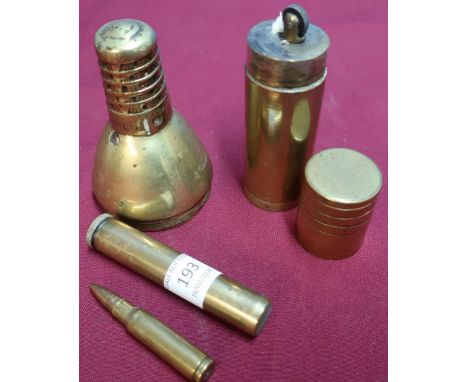 Inert L2A2 round, a 303 AM oil bottle, a shell fuse head (inert) stamped Ypres and a large trench art table lighter (4) 