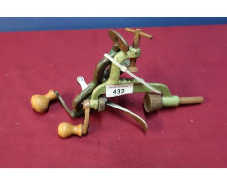 Two vintage rollover tools, one marked 12 