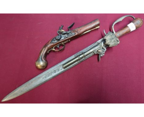Replica continental combination flintlock pistol hunting sword and a replica brass barrelled flintlock pistol (2) 