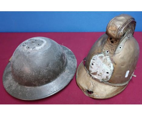 Late Victorian copper fireman's type helmet with raised and embossed cross with figure of a dragon (A/F) and a plastic body a