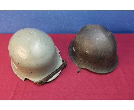 German Third Reich Civil steel helmet with leather liner and chin strap, with later painted detail and a Bulgarian type circa