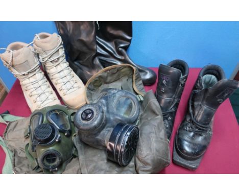 Pair of British Army issue Lowa dessert boots, various other military boots and two haversacks with respirators 