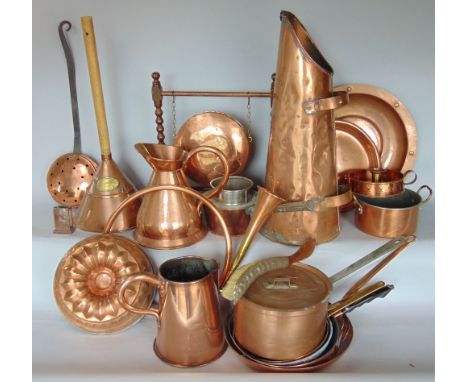 A mixed lot of antique copper ware to include jelly moulds, stick stands, plungers, jugs, etc