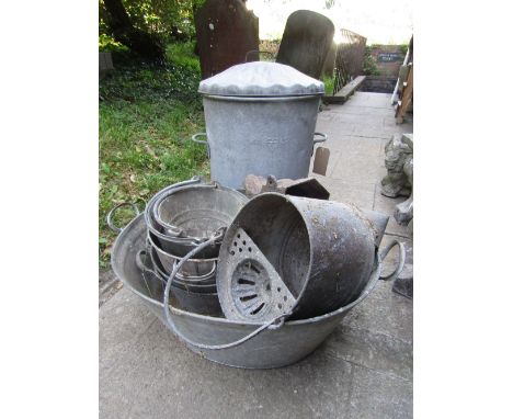 A quantity of vintage galvanized wear to include an oval two handled tin bath, selection of buckets, dustbin, etc
