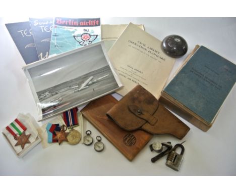 An interesting collection of items including a RAF navigator's, air bomber's and air gunner's flying log book dated 1943 to S