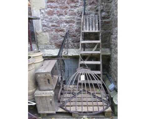 A vintage corner hay manger, a large iron work exterior wall mounted sign bracket (probably public house), a further bracket,