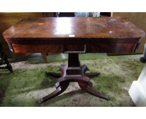 A Regency mahogany foldover top D end card table on square cut pillar and platform and four sabre supports