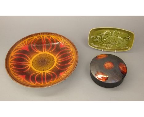 A collection of Poole pottery wares comprising a charger with abstract decoration in orange and brown on a mottled ground, 26
