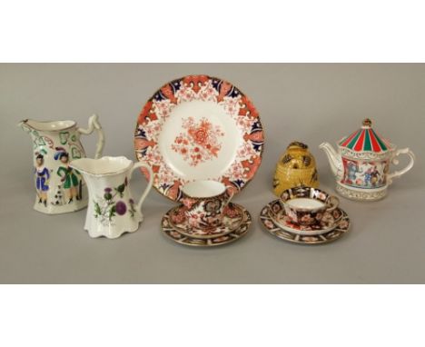 A collection of Crown Derby Imari pattern wares comprising a trio and extra tea plate in pattern number 2451, a further cup a