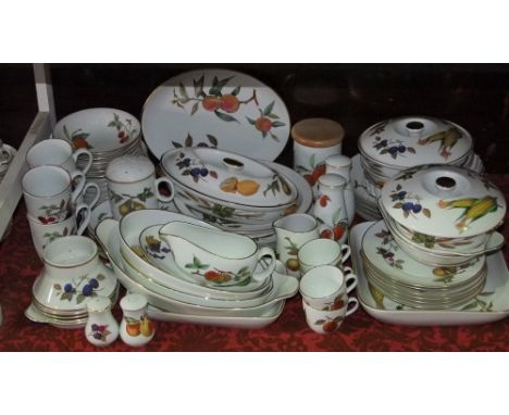 An extensive collection of Royal Worcester Evesham pattern oven to table wares including serving dishes and covers, oval meat