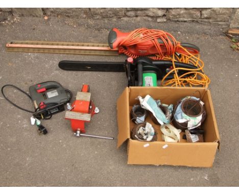 A Flymo Easicut 600XT electric hedge trimmer, A Florabest electric chain saw FKS2200 C2, a 500w performance power jigsaw, fou