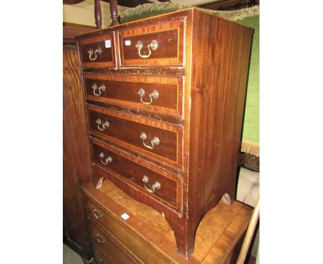 A small reproduction Regency style caddy top chest of three long and two short drawers with string banded inlay, shaped apron