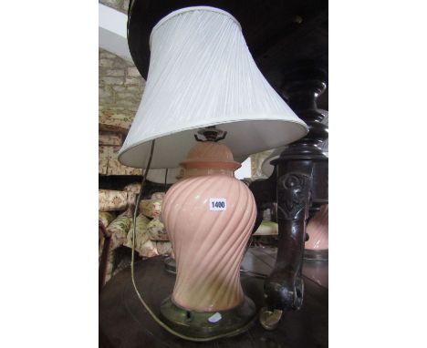 A set of four contemporary light pink glazed ceramic table lamps in the form of baluster shaped jars and covers with wrythen 