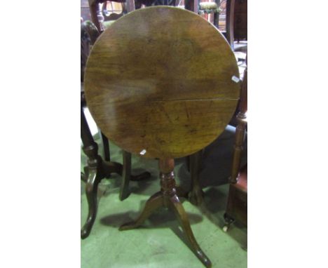 A small Georgian snap top table, circular top, turned pillar, tripod base in mixed woods including fruitwood, 50 cm diameter