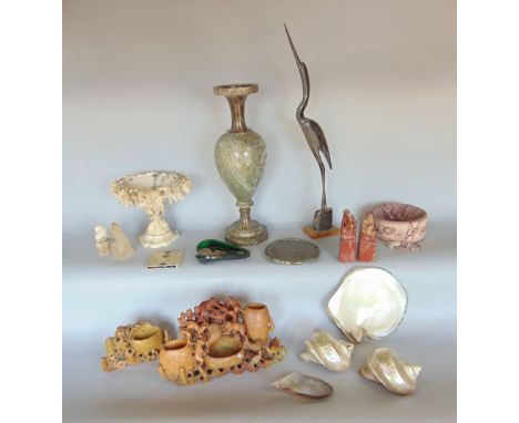 A box of interesting items to include soapstone carvings, shells, together with a carved hardstone baluster lamp and others