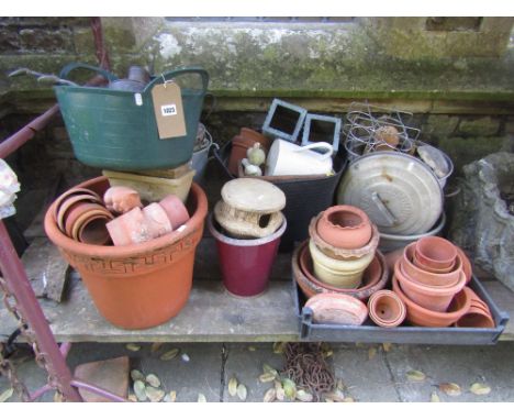 A quantity of mainly contemporary terracotta flower pots of varying size and design, a selection of galvanized buckets, cream