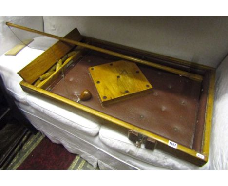 A vintage bar skittles with nine ashwood pins