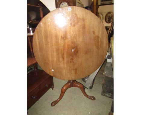 A good Georgian mahogany snap top table, the circular one piece top 85 cm diameter raised on a turned pillar, bird cage and s