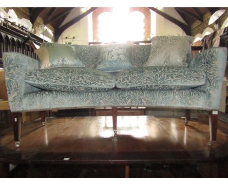 A good quality contemporary two seat sofa in the Georgian style with curved outline, scrolled arms and cut stylised floral mo