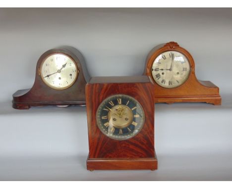 An interesting flame mahogany mantle clock, with ebonised chapter ring, open escapement and gilt Roman numerals, fitted with 