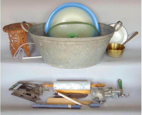 A galvanized baby bath together with a collection of enamel wares and kitchenalia and others 