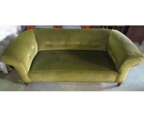 A late Victorian two to three seat Chesterfield sofa with rolled arms, simple buttoned back and green dralon upholstered rais