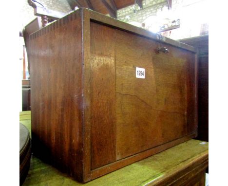 A small vintage portable engineers tool chest with removable fall front enclosing four long drawers to interior, applied labe