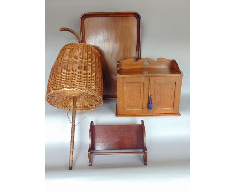 A mixed wood lot to include an Edwardian oak and marquetry inlaid smokers cabinet, a twin handled breakfast tray, a book trou