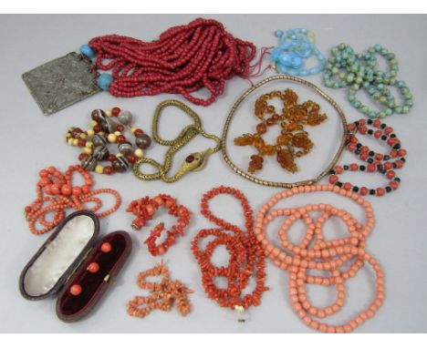 A collection of antique and vintage bead necklaces to include two examples in the form of snakes, a boxed set of three coral 