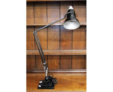 a vintage Herbert Terry angle poise table lamp in black colourway with square two step platform base