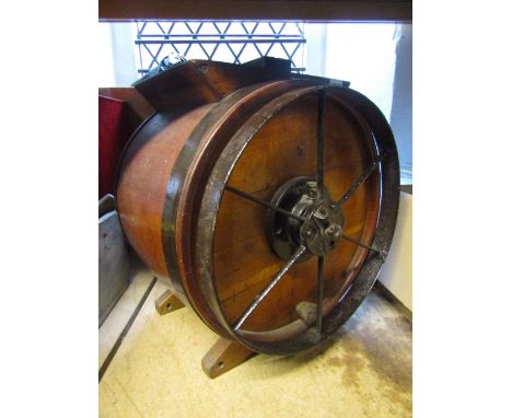 A vintage coopered oak and steel banded table top butter churn by RA Lister & Co Dairy Engineers, Dursley, Glos, cast iron fl