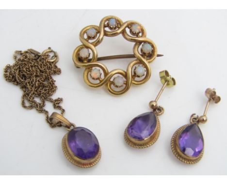 A 9ct faceted amethyst demi parure comprising necklace and earrings, together with an opal set brooch of intertwined circular