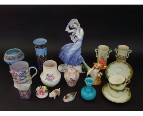 A collection of art deco type ceramics including a figure of a lady in a blue dress, a pair of Royal Doulton vases showing Lu