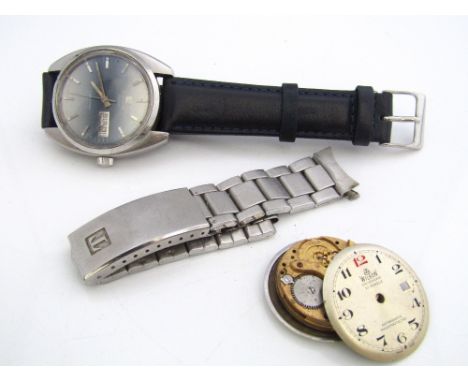 A 1970s vintage Tissot C Star Automatic, with two tone dial, baton markers, day date aperture, leather strap; together with a