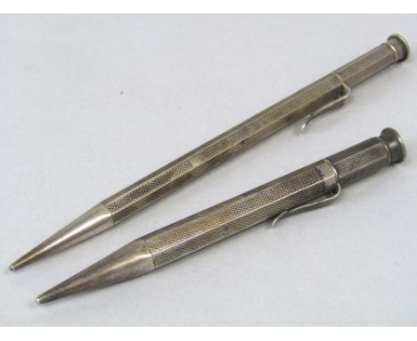 Two similar Sampson and Mordan Co engine turned silver pencils