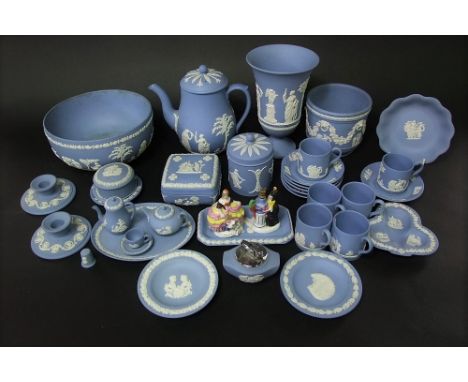 A quantity of Wedgwood blue ground jasper wares including coffee pot, vase with flared rim, fruit bowl, miniature teawares, o