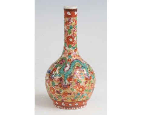 A Chinese blue and white porcelain bottle vase, 18th century, having later European 'clobbered' decoration and psuedo red ove