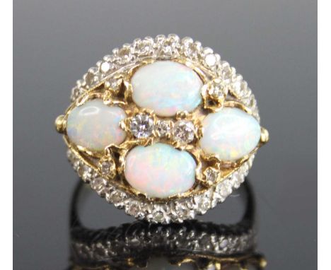 A yellow and white metal, opal and diamond bombe cluster ring, featuring a centre quatrefoil of oval opal cabochons intersper