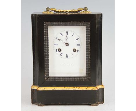 A mid-19th century French ebonised carriage clock, having gilt brass carry handle, white enamel Roman dial signed by the reta