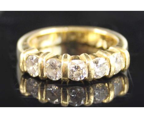 An 18ct yellow gold diamond half eternity ring, featuring five round brilliant cut diamonds in bar settings, diamond dimensio