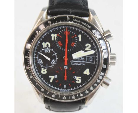 A gents stainless steel Omega Speedmaster automatic wristwatch, having a round black Arabic dial with luminous numerals and t