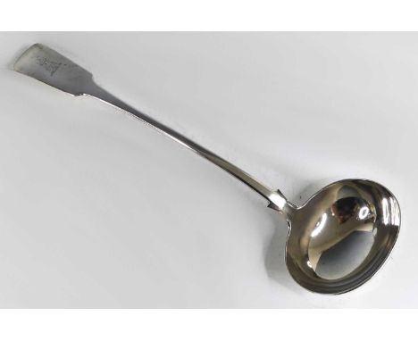 A Victorian silver soup ladle, in the Fiddle pattern, the terminal bright cut engraved with a heraldic tower to the upper sid