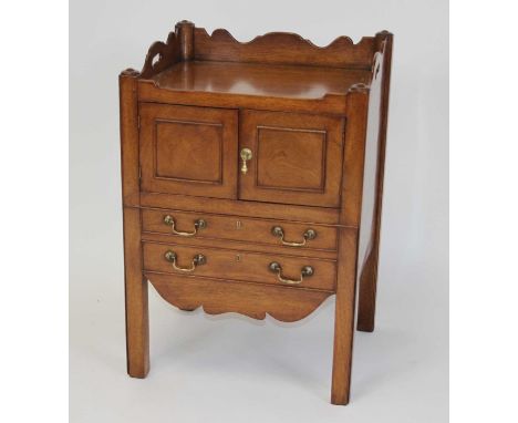 A George III mahogany tray-top night commode, having two drawers above a pull-out base with converted interior, w.55cm, d.45c